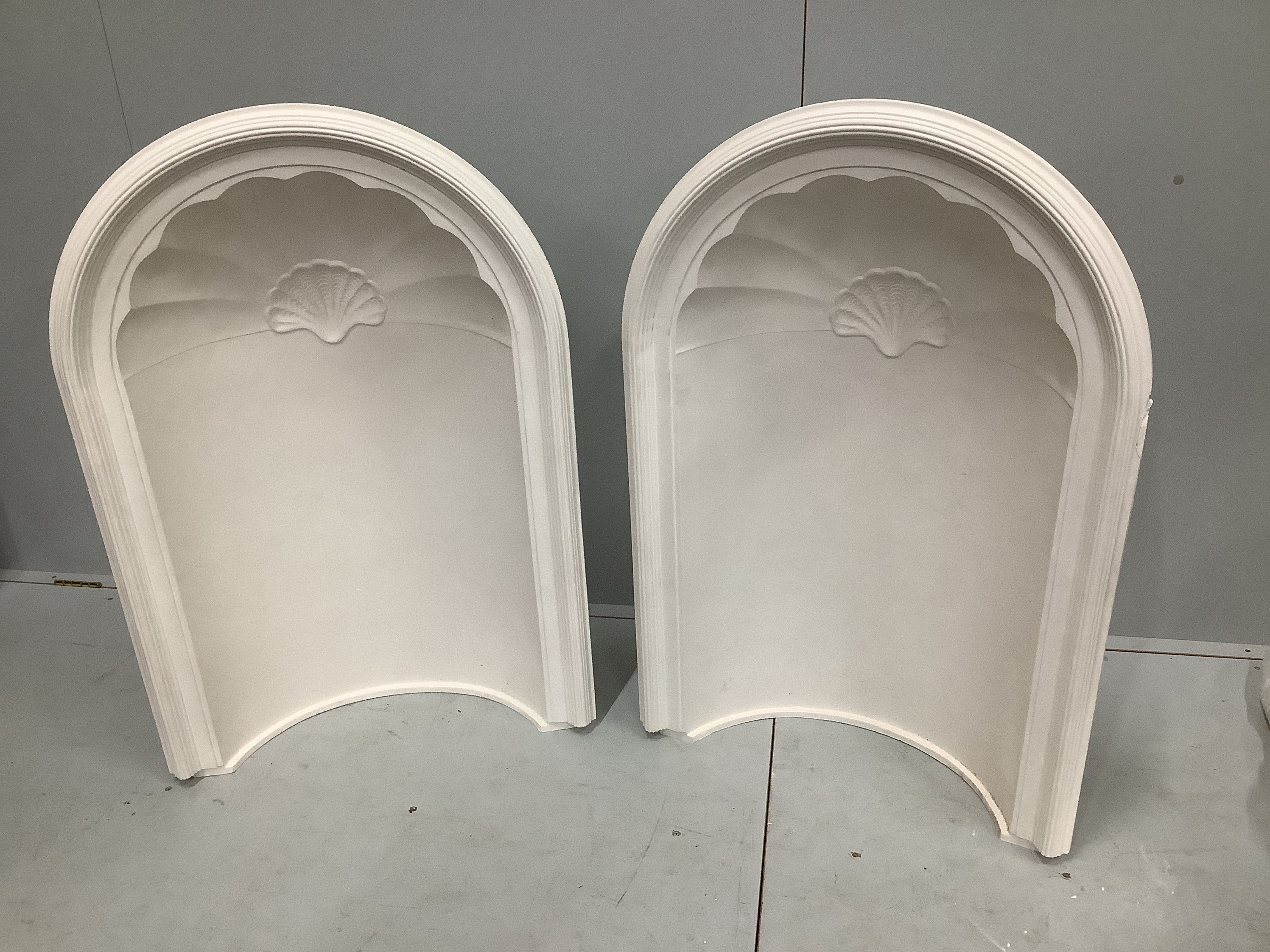 A pair of Hodkin & Jones Milano cast plaster niches, width 72cm, height 140cm